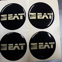 Наклейки на колпаки, диам. 60 мм "SEAT" черные (4 шт) 